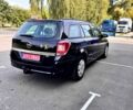 Черный Опель Астра, объемом двигателя 1.6 л и пробегом 234 тыс. км за 5600 $, фото 1 на Automoto.ua