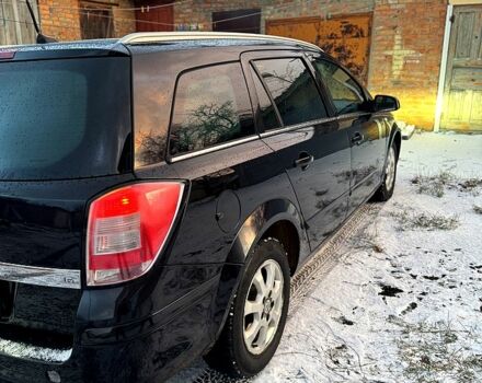 Черный Опель Астра, объемом двигателя 1.6 л и пробегом 278 тыс. км за 5700 $, фото 12 на Automoto.ua