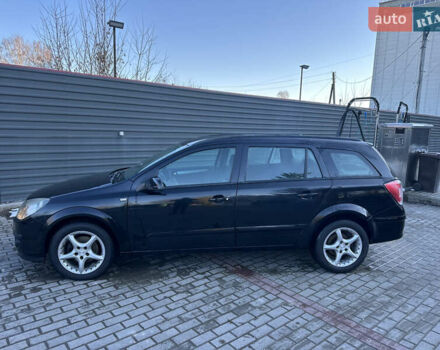 Черный Опель Астра, объемом двигателя 1.6 л и пробегом 228 тыс. км за 4400 $, фото 1 на Automoto.ua