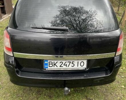 Черный Опель Астра, объемом двигателя 1.6 л и пробегом 272 тыс. км за 5100 $, фото 2 на Automoto.ua