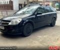 Черный Опель Астра, объемом двигателя 1.6 л и пробегом 255 тыс. км за 3999 $, фото 1 на Automoto.ua