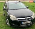 Черный Опель Астра, объемом двигателя 1.6 л и пробегом 220 тыс. км за 5500 $, фото 1 на Automoto.ua
