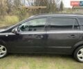 Черный Опель Астра, объемом двигателя 1.6 л и пробегом 272 тыс. км за 5100 $, фото 1 на Automoto.ua