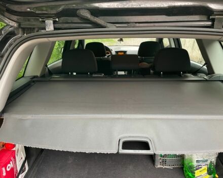 Черный Опель Астра, объемом двигателя 1.6 л и пробегом 264 тыс. км за 5000 $, фото 4 на Automoto.ua