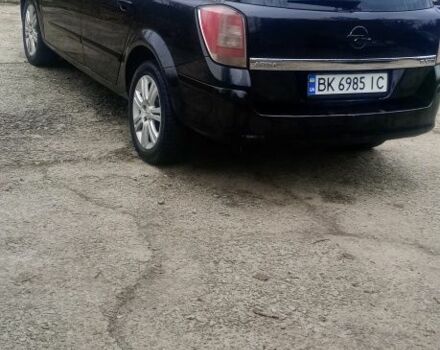 Черный Опель Астра, объемом двигателя 1.9 л и пробегом 248 тыс. км за 5100 $, фото 2 на Automoto.ua