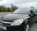 Черный Опель Астра, объемом двигателя 1.6 л и пробегом 263 тыс. км за 5200 $, фото 1 на Automoto.ua