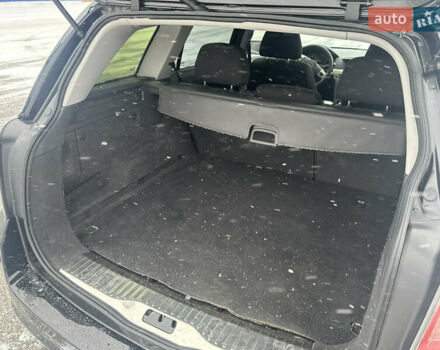 Черный Опель Астра, объемом двигателя 1.9 л и пробегом 370 тыс. км за 4250 $, фото 7 на Automoto.ua