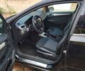Черный Опель Астра, объемом двигателя 1.8 л и пробегом 177 тыс. км за 6400 $, фото 1 на Automoto.ua