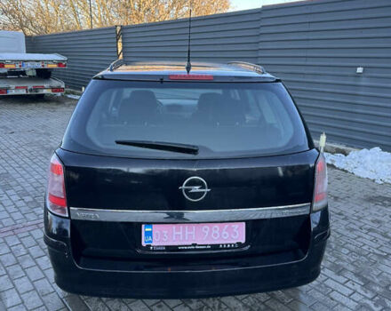 Черный Опель Астра, объемом двигателя 1.6 л и пробегом 228 тыс. км за 4400 $, фото 3 на Automoto.ua