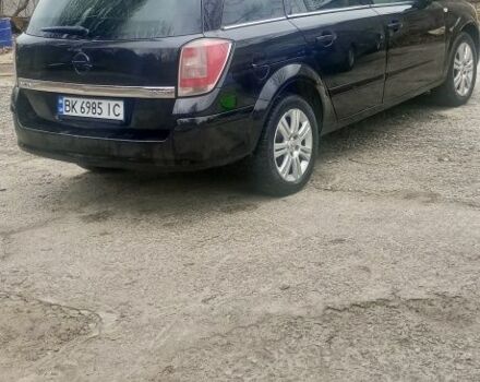 Черный Опель Астра, объемом двигателя 1.9 л и пробегом 248 тыс. км за 5100 $, фото 4 на Automoto.ua
