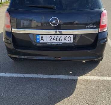 Черный Опель Астра, объемом двигателя 1.6 л и пробегом 319 тыс. км за 4500 $, фото 6 на Automoto.ua