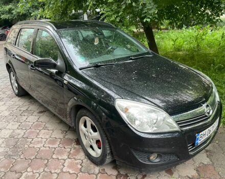 Черный Опель Астра, объемом двигателя 1.6 л и пробегом 264 тыс. км за 5000 $, фото 1 на Automoto.ua
