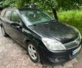 Черный Опель Астра, объемом двигателя 1.6 л и пробегом 264 тыс. км за 5000 $, фото 1 на Automoto.ua
