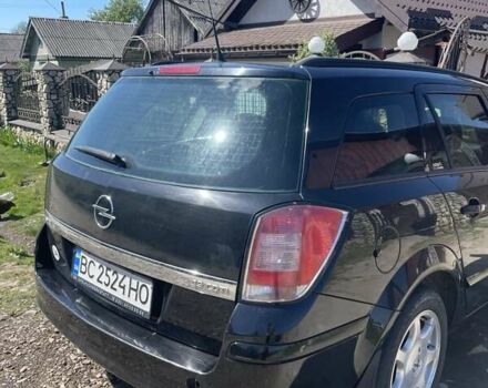 Черный Опель Астра, объемом двигателя 1.91 л и пробегом 310 тыс. км за 5050 $, фото 6 на Automoto.ua