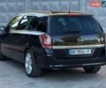 Черный Опель Астра, объемом двигателя 1.8 л и пробегом 250 тыс. км за 5450 $, фото 6 на Automoto.ua
