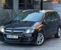 Черный Опель Астра, объемом двигателя 1.8 л и пробегом 250 тыс. км за 5450 $, фото 1 на Automoto.ua