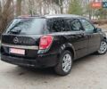 Черный Опель Астра, объемом двигателя 1.8 л и пробегом 238 тыс. км за 6050 $, фото 18 на Automoto.ua