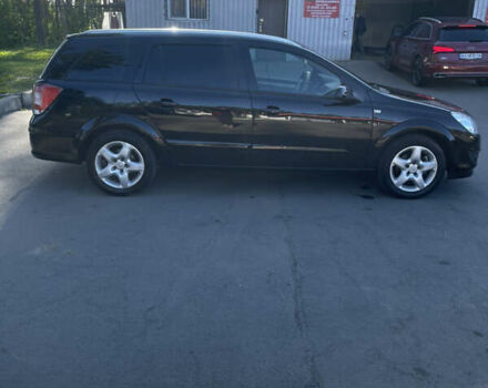 Черный Опель Астра, объемом двигателя 1.8 л и пробегом 226 тыс. км за 5390 $, фото 4 на Automoto.ua