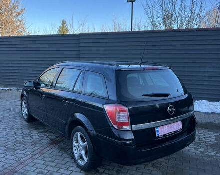 Черный Опель Астра, объемом двигателя 1.6 л и пробегом 228 тыс. км за 4400 $, фото 2 на Automoto.ua
