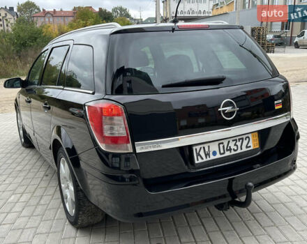 Черный Опель Астра, объемом двигателя 1.6 л и пробегом 250 тыс. км за 4399 $, фото 10 на Automoto.ua