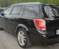 Черный Опель Астра, объемом двигателя 1.6 л и пробегом 233 тыс. км за 3399 $, фото 8 на Automoto.ua