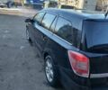 Черный Опель Астра, объемом двигателя 1.9 л и пробегом 294 тыс. км за 4000 $, фото 4 на Automoto.ua