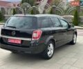 Черный Опель Астра, объемом двигателя 1.6 л и пробегом 186 тыс. км за 5600 $, фото 29 на Automoto.ua