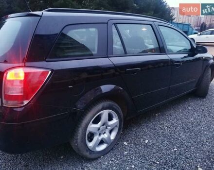 Чорний Опель Астра, об'ємом двигуна 1.6 л та пробігом 245 тис. км за 4950 $, фото 3 на Automoto.ua