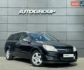 Черный Опель Астра, объемом двигателя 1.6 л и пробегом 160 тыс. км за 5600 $, фото 1 на Automoto.ua