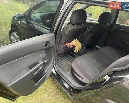 Черный Опель Астра, объемом двигателя 1.6 л и пробегом 272 тыс. км за 5100 $, фото 12 на Automoto.ua