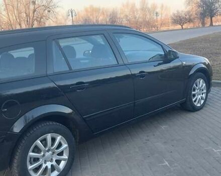Черный Опель Астра, объемом двигателя 1.6 л и пробегом 231 тыс. км за 5800 $, фото 4 на Automoto.ua