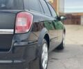 Черный Опель Астра, объемом двигателя 1.6 л и пробегом 239 тыс. км за 5350 $, фото 7 на Automoto.ua