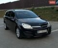 Черный Опель Астра, объемом двигателя 1.6 л и пробегом 328 тыс. км за 4400 $, фото 1 на Automoto.ua
