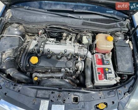 Черный Опель Астра, объемом двигателя 1.91 л и пробегом 242 тыс. км за 4500 $, фото 12 на Automoto.ua