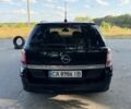 Черный Опель Астра, объемом двигателя 1.9 л и пробегом 250 тыс. км за 4902 $, фото 4 на Automoto.ua
