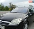 Черный Опель Астра, объемом двигателя 1.6 л и пробегом 263 тыс. км за 5200 $, фото 1 на Automoto.ua