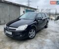 Черный Опель Астра, объемом двигателя 1.6 л и пробегом 213 тыс. км за 5500 $, фото 1 на Automoto.ua