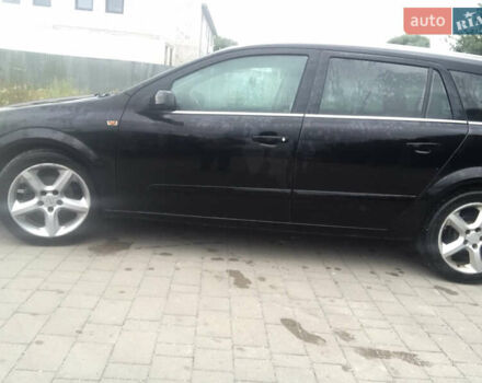 Черный Опель Астра, объемом двигателя 1.6 л и пробегом 305 тыс. км за 4000 $, фото 4 на Automoto.ua