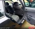 Черный Опель Астра, объемом двигателя 1.7 л и пробегом 220 тыс. км за 4999 $, фото 7 на Automoto.ua