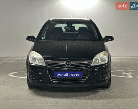 Черный Опель Астра, объемом двигателя 1.6 л и пробегом 216 тыс. км за 5600 $, фото 2 на Automoto.ua