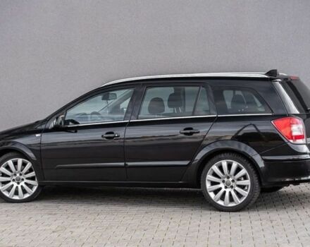 Черный Опель Астра, объемом двигателя 1.9 л и пробегом 300 тыс. км за 2650 $, фото 5 на Automoto.ua