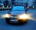 Черный Опель Астра, объемом двигателя 1.6 л и пробегом 245 тыс. км за 4950 $, фото 1 на Automoto.ua