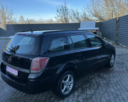 Черный Опель Астра, объемом двигателя 1.6 л и пробегом 228 тыс. км за 4400 $, фото 6 на Automoto.ua