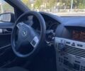 Черный Опель Астра, объемом двигателя 1.2 л и пробегом 296 тыс. км за 4350 $, фото 3 на Automoto.ua