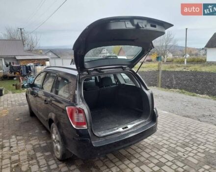 Черный Опель Астра, объемом двигателя 1.7 л и пробегом 237 тыс. км за 5100 $, фото 6 на Automoto.ua