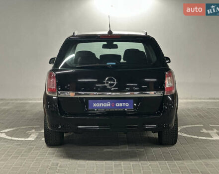 Черный Опель Астра, объемом двигателя 1.6 л и пробегом 216 тыс. км за 5600 $, фото 3 на Automoto.ua