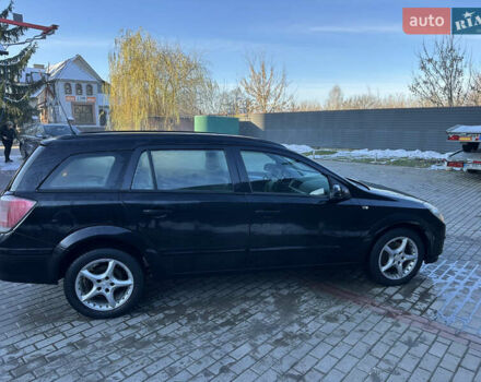 Черный Опель Астра, объемом двигателя 1.6 л и пробегом 228 тыс. км за 4400 $, фото 4 на Automoto.ua