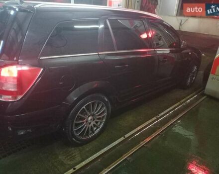 Черный Опель Астра, объемом двигателя 1.6 л и пробегом 180 тыс. км за 4999 $, фото 3 на Automoto.ua