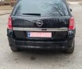 Черный Опель Астра, объемом двигателя 1.8 л и пробегом 238 тыс. км за 6050 $, фото 12 на Automoto.ua