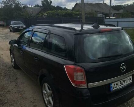 Черный Опель Астра, объемом двигателя 1.6 л и пробегом 165 тыс. км за 5500 $, фото 3 на Automoto.ua
